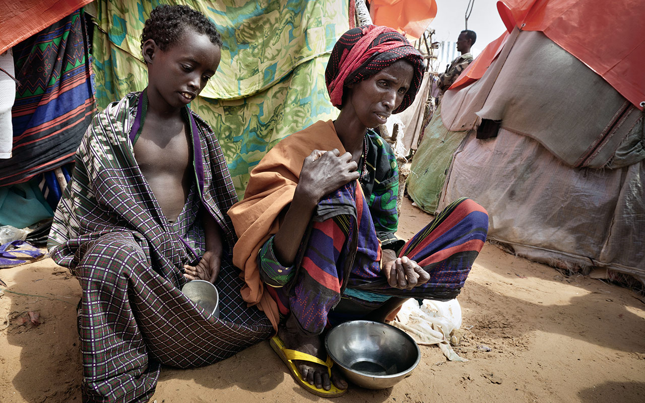 Somalia / Mogadishu, July 2011: this woman fled with her children from Baidoa, located 250 kilometres away, to the IDP Camp Al-Hidaaya. © Christoph Püschner/Zeitenspiegel